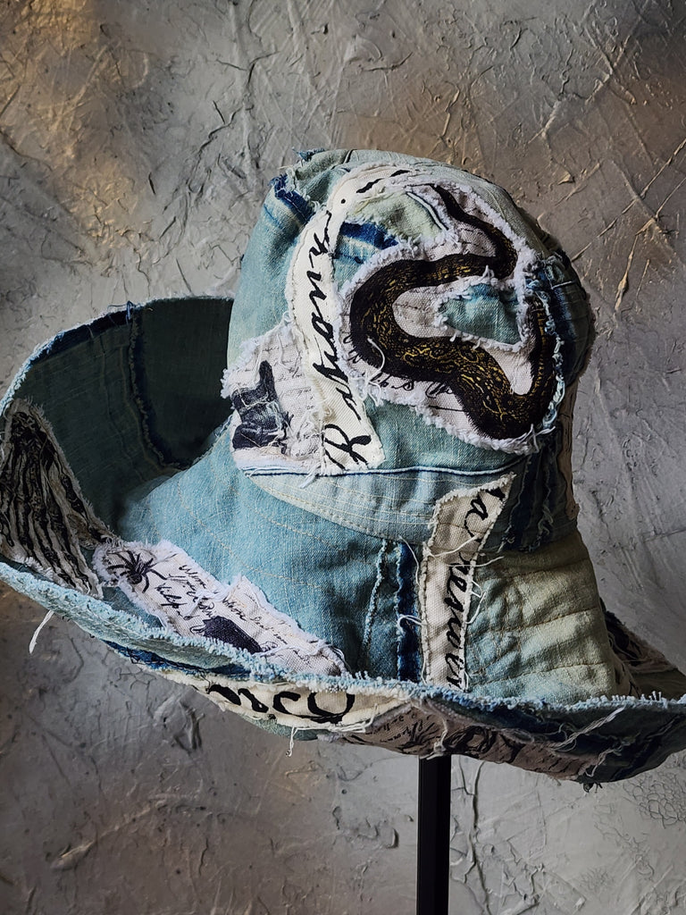 ARCHIVIST / Avant-Garde Sculptured Tophat Wide Side Upcycled Denim Raw Cut Snake Print Patched Dark Academy Vintage style